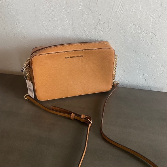Michael Kors Handbags - Michael Kors Acorn Tan Crossbody bag purse NWT